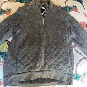 Lululemon Grey quilted half-zip pullover jacket.